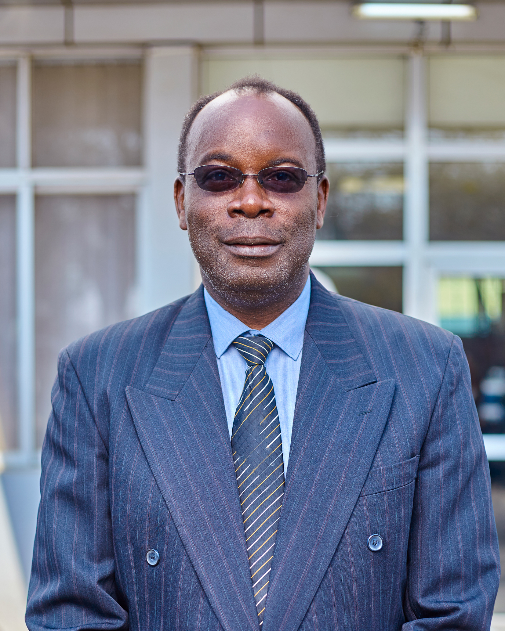 Dr. Herrick C. Mpuku